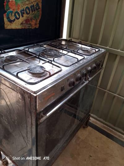 Five Burner Cooking Range with Oven.