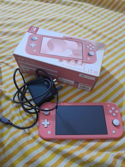 Coral Pink Nintendo Switch Lite (Like Brand New)