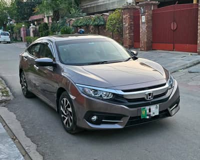 Honda civic oriel prosmetic UG full option car