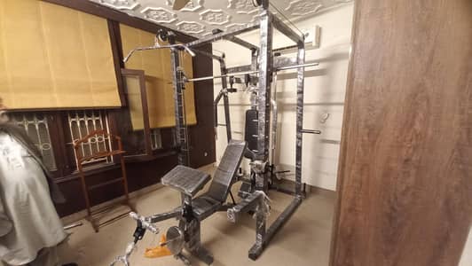 cable cross over Smith functional trainer squat rack power tower multi