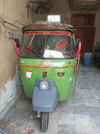 نیو ایشیا اٹو رکشہ گرین کلر نیو کنڈیشن بہت کم چلا ہوا دو انجن ائل چینج