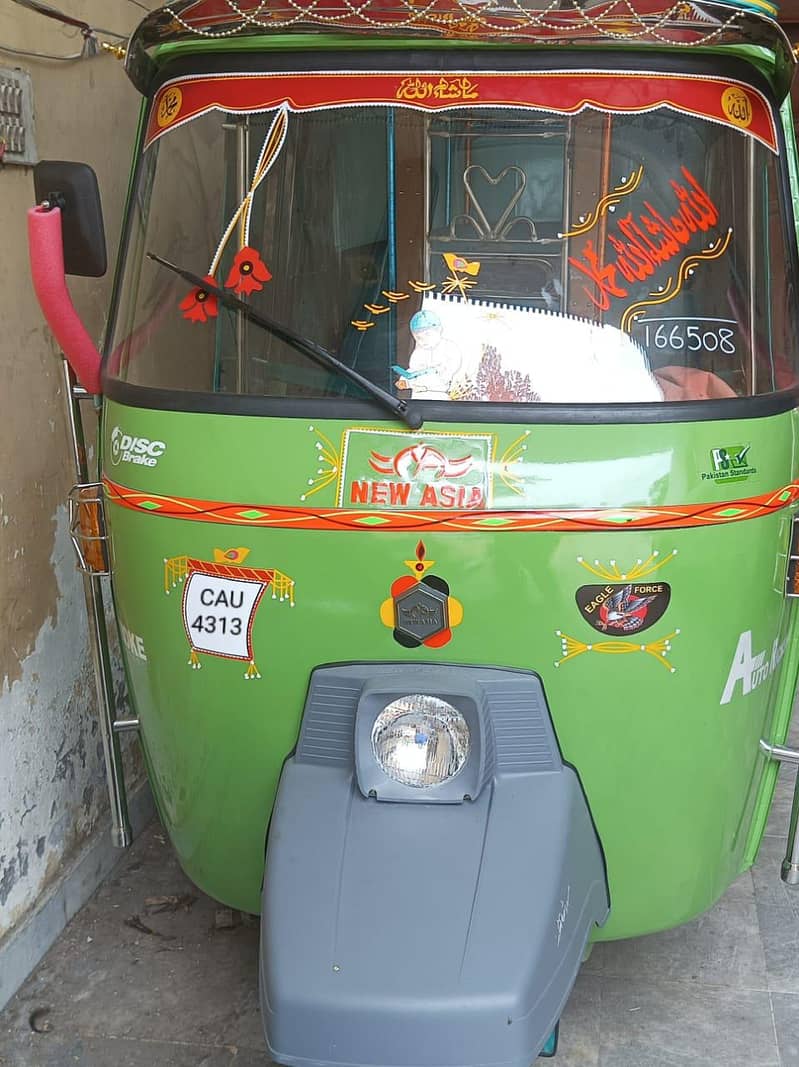 نیو ایشیا اٹو رکشہ گرین کلر نیو کنڈیشن بہت کم چلا ہوا دو انجن ائل چینج 2