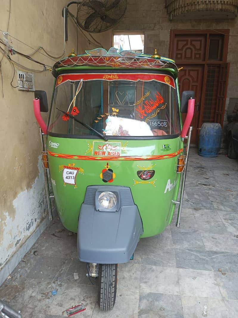 نیو ایشیا اٹو رکشہ گرین کلر نیو کنڈیشن بہت کم چلا ہوا دو انجن ائل چینج 3