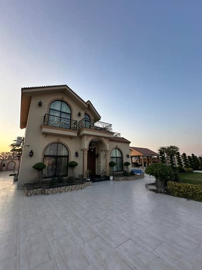 FULLY FURNISHED 4 KANAL SPANISH STYLE FARMHOUSE WITH POOL, GAZEBO WITH HUGE GARDEN AND EXPENSIVE PLANTS.