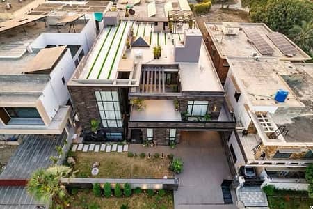 PHASE 6 2-KANAL BRAND NEW FULL BASEMENT FULLY FURNISHED BUNGALOW WITH SWIMMING POOL AND HOME THEATRE IS AVAILABLE FOR SALE.