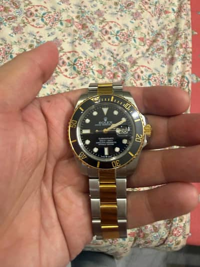 black and golden watch