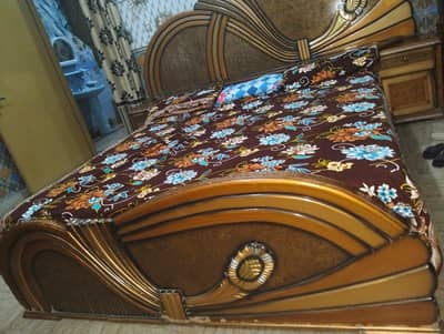 Double Bed with 2 side tables along with other furniture