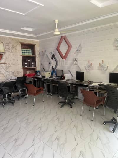 Three classroom computer tables.