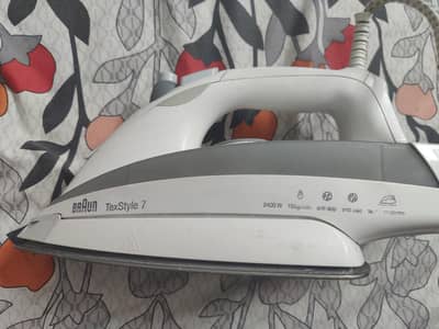 braun + Philips steam iron for sale