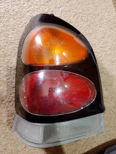 2006 Suzuki Alto left side back light