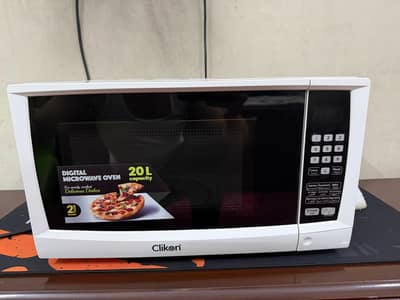 Clickon Microwave Oven – Fast Heating | Excellent Condition | Home Use