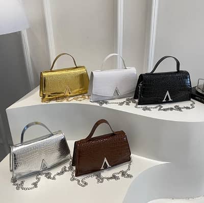 Structured Top-Handle Satchel with Signature Gold-Tone V-Hardware