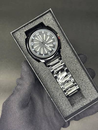 stenlesssteel spinning watch with box