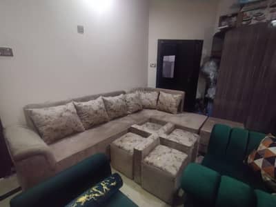 L shaped sofa with center table 4 puffy