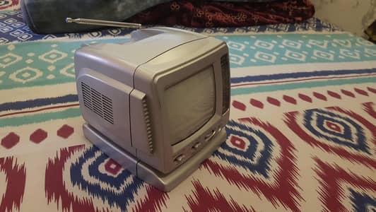 portable vintage television  3 in 1 for sale.