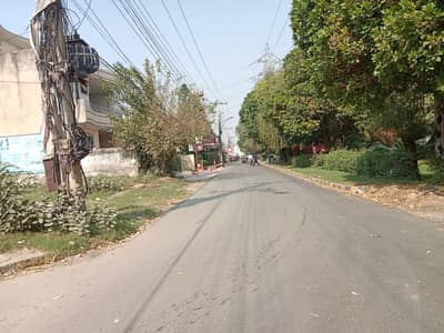 1 Kanal Plot Facing Green Belt Very Near To Wahdat Road.