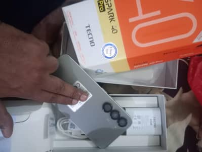 tecno spark 40 pro. almost 11 month warranty full box
