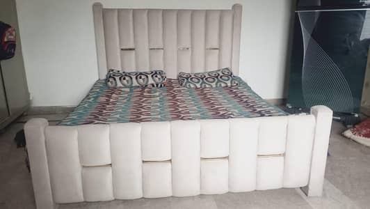 wooden pohish bed without mattress n side tables. . only double bed
