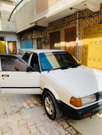 Nissan sunny Islamabad number. Original colour.