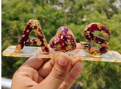 resin customized jewellery, keychains, mobile back cover and much more