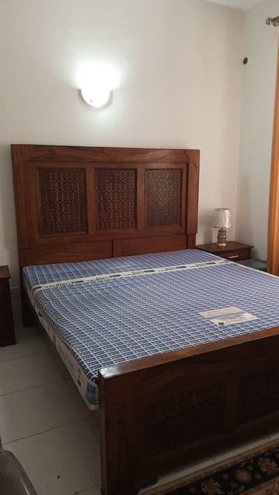 King size Wooden bed, 2 side tables, mattress 1 leather chair 1 cabine