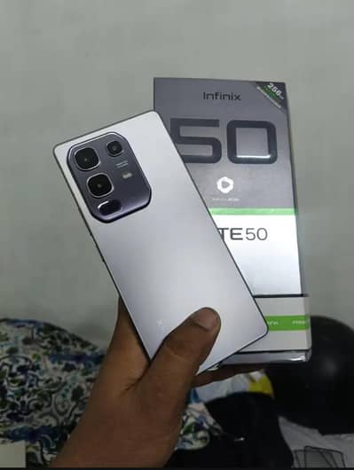 tan by tan phone all okay hai full box and wireless charger