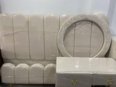 new bed and side tables and dressing