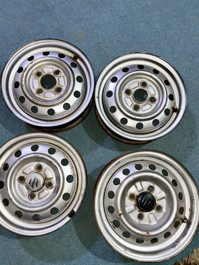 13 Inch 4-Bolt Steel Rims – Genuine OEM – Clean Condition