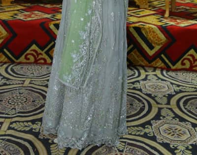wedding party wear maxi in grey colour with sea green net duppatta