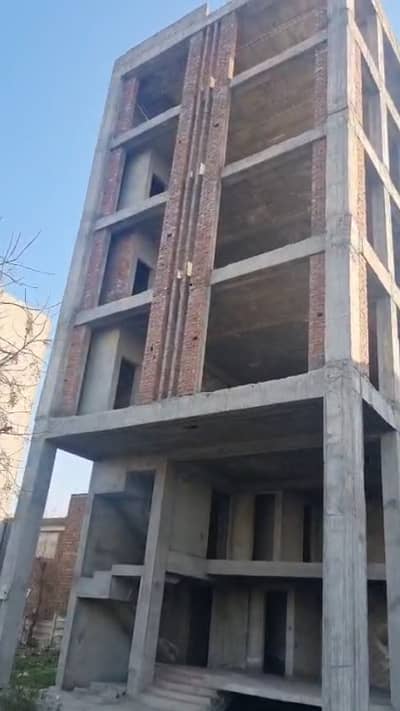 GRAY STRUCTURE 4.35 MARLA COMMERCIAL IS AVAILABLE IN DHA TOP LOCATION FOR COMMERCIAL PURPOSE.