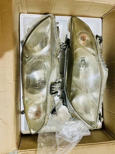 Toyota GLi 10 model genuine front  lights both side