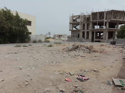 Commercial Plot Kh e Akram Shahee 100 Square Yards In DHA Phase 7 Extension, Karachi