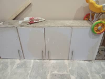 kitchen cabinets or sink or marble slab