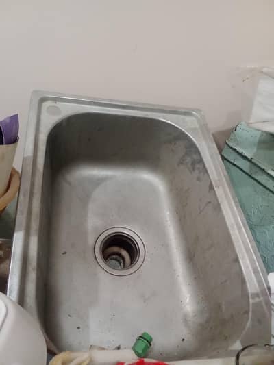 kitchen cabinets or sink or marble slab