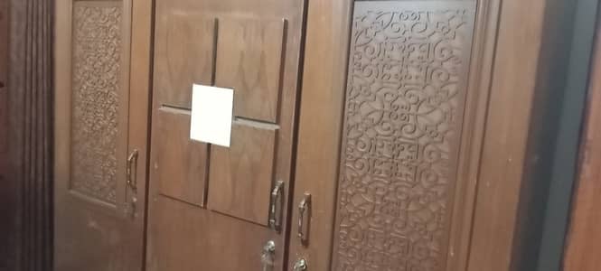 BROWN WOOD WARDROBE 4 DOORS - GOOD CONDITION