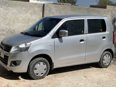 Suzuki wagon R VXR 2018 model silver colour . Chat pilar genuine.