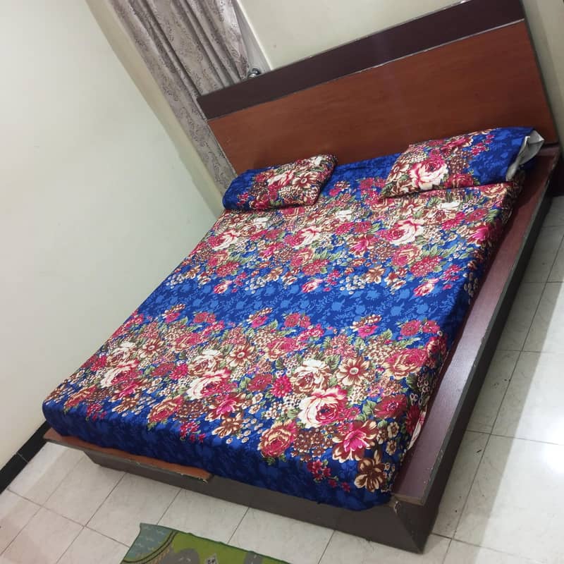 double bed with side table 0