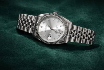 ROLEX silver stainless-steel. Diamond dial.