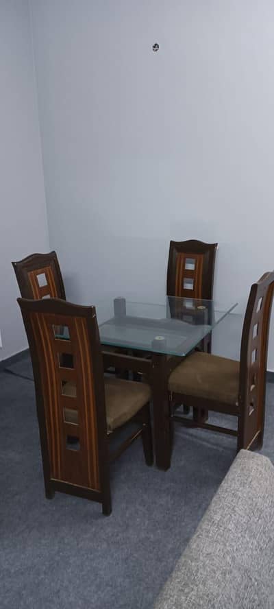 4 seater dining table almost new . very good condition