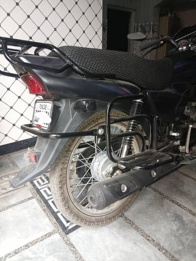 Footrest with back guard