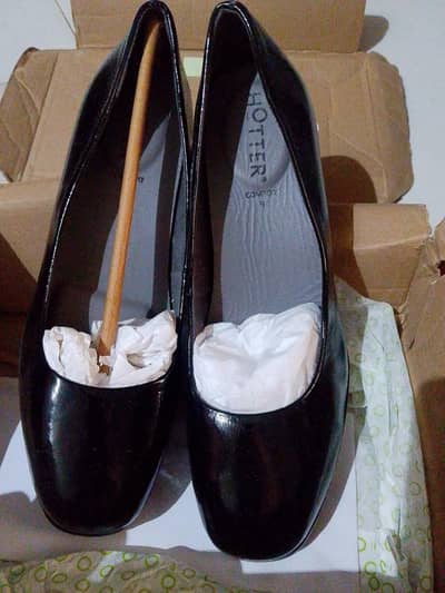 shiny black leather heels