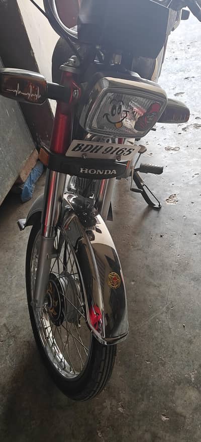 Honda CD red  color 2024 model