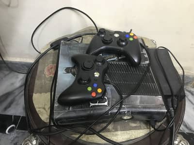 Xbox 360 slim with 2 wired controllers