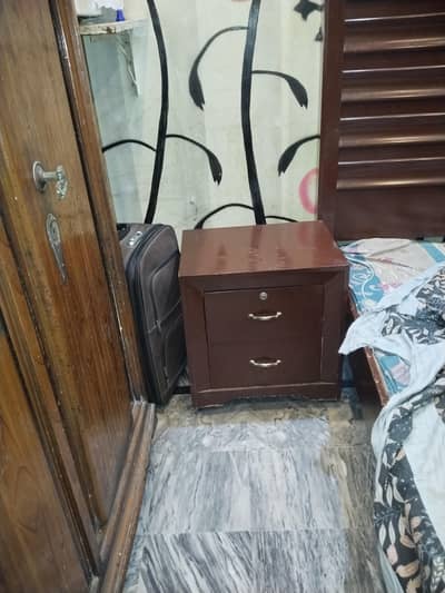 bed dressing and one side table