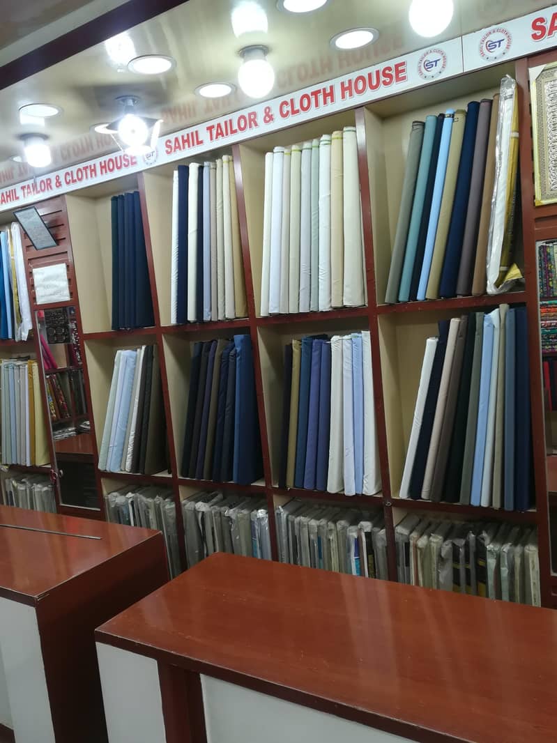 کپڑے کی چلتی ھو ءی دو کا ن برائے فروخت 0