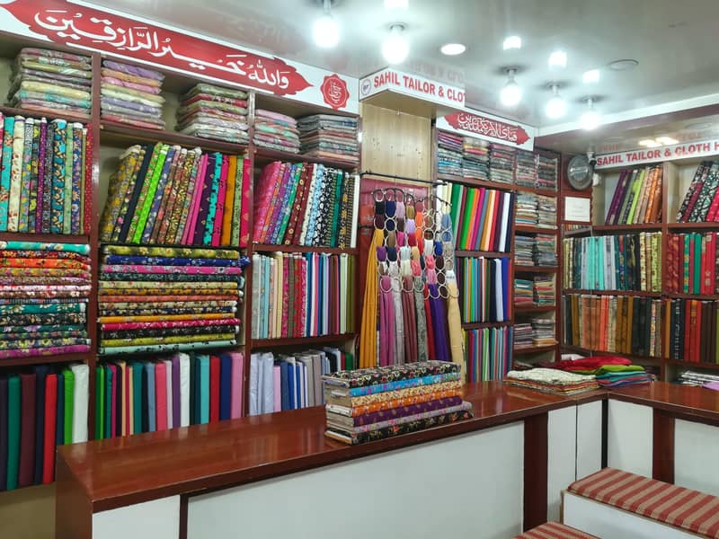 کپڑے کی چلتی ھو ءی دو کا ن برائے فروخت 4