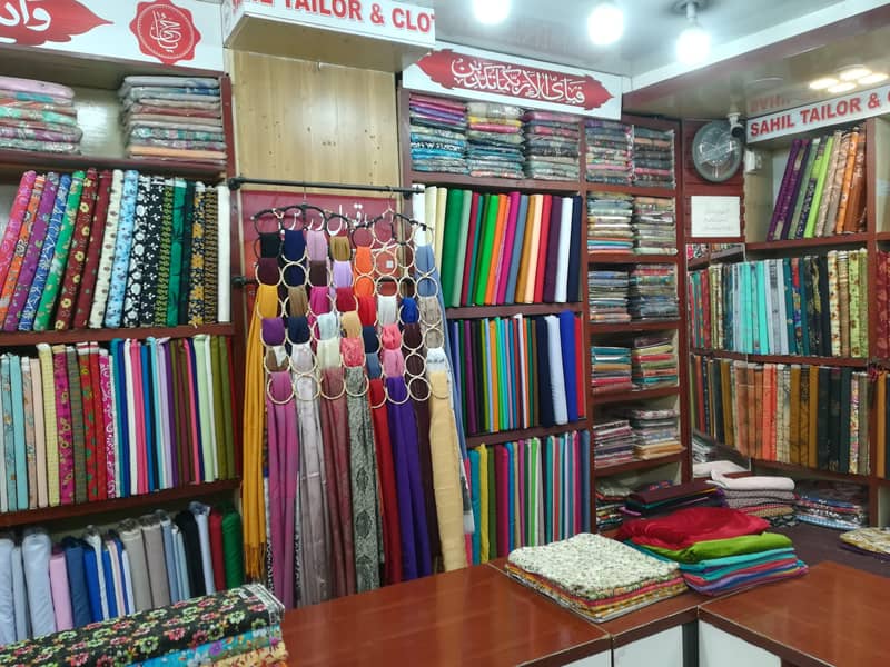 کپڑے کی چلتی ھو ءی دو کا ن برائے فروخت 5