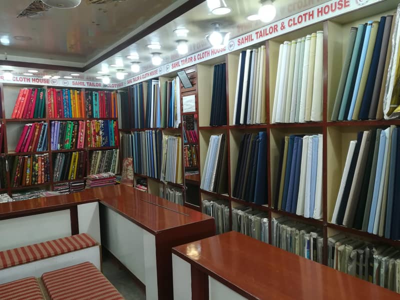 کپڑے کی چلتی ھو ءی دو کا ن برائے فروخت 6