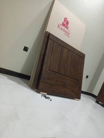 Two single beds and wordrobe