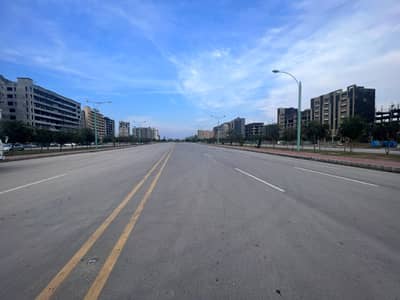 1 Kanal corner Plot in Bahria hamlet top Height Location with extraland Available for sale ( plot no 1-B street 10)